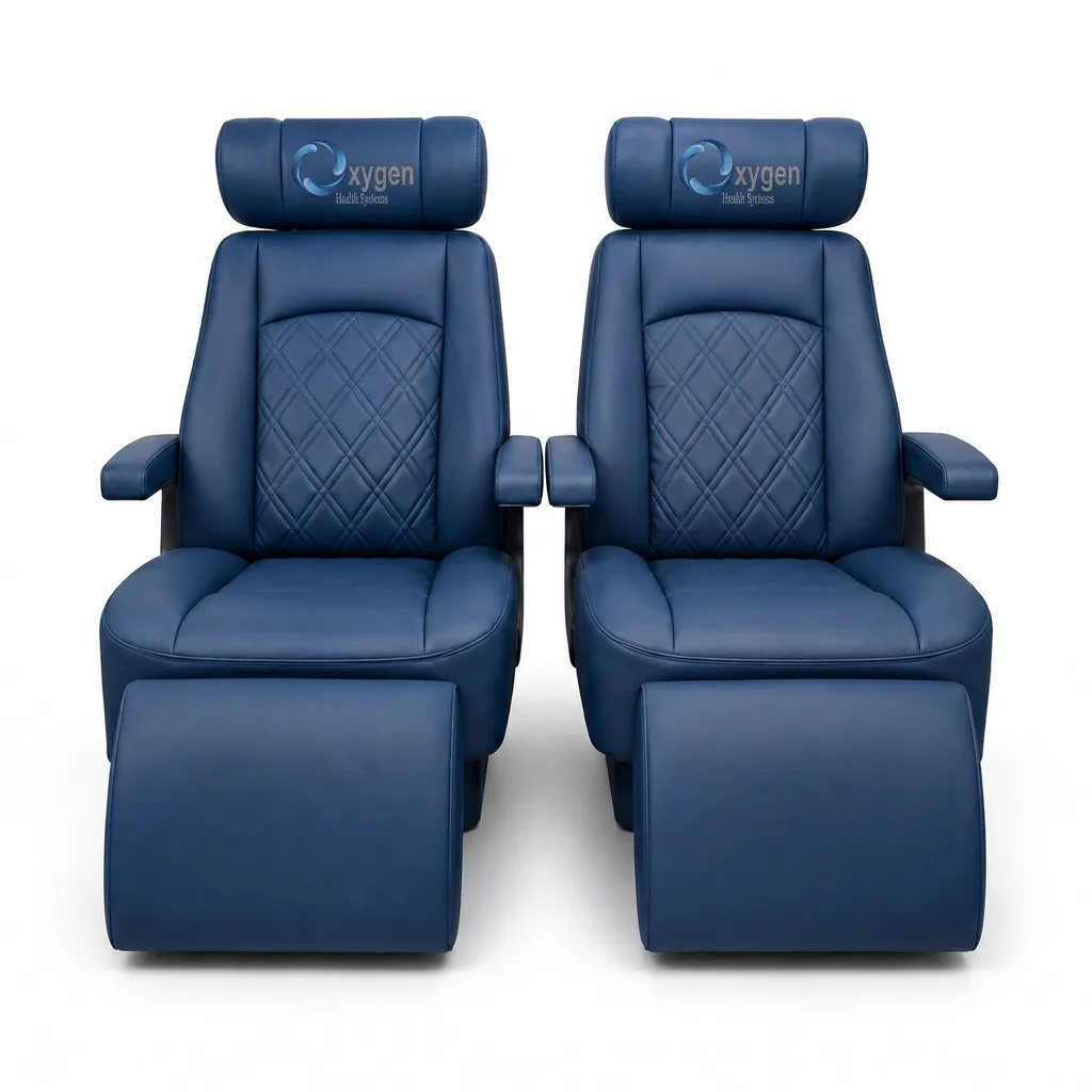 Pair of navy blue quilted leather recliners with Oxygen Health Systems headrests and extended footrests, diamond-stitched backrests and padded armrests
